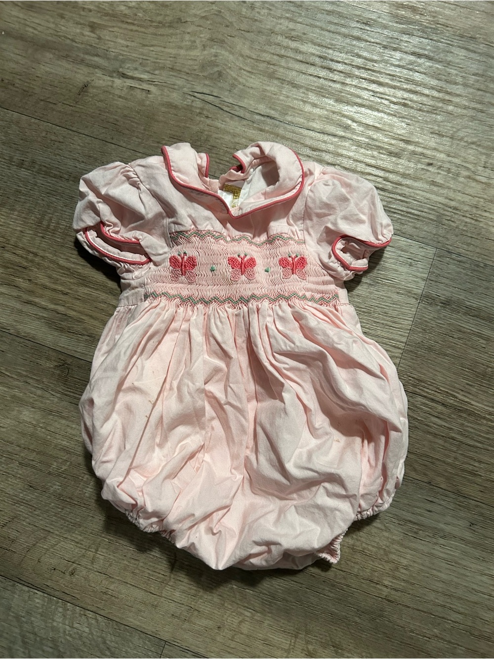Antoinette Paris pink baby girl romper with smocking and embroidery